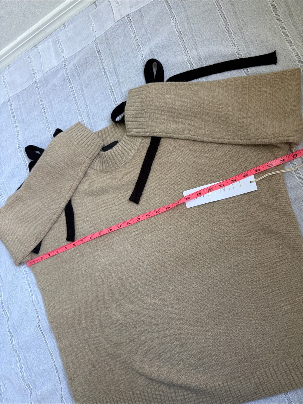 Lumiere’s Beige Cold-Shoulder Knit Sweater with Black Tie Details - Picture 12 of 13